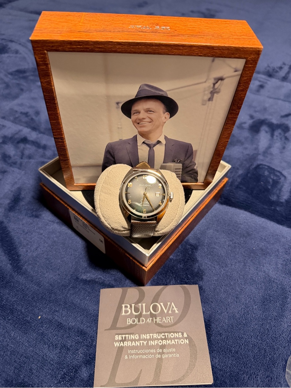 Frank Sinatra 
Bulova Brown Wood Picture Frame with Blue Photo Accent.